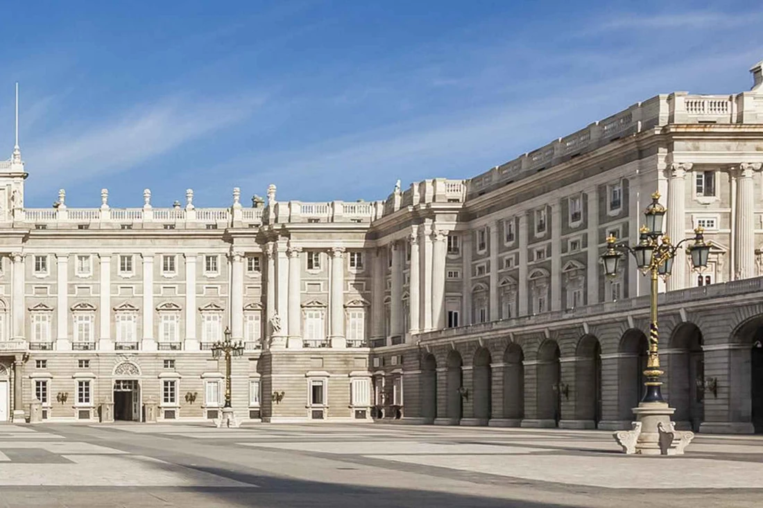 The Royal Palace of Madrid seen from the Plaza de Oriente, a grand palace-museum in Madrid, Spain