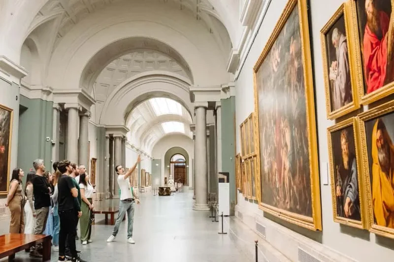 The deep-red galleries of the Prado, the most famous of the museums in Madrid, Spain