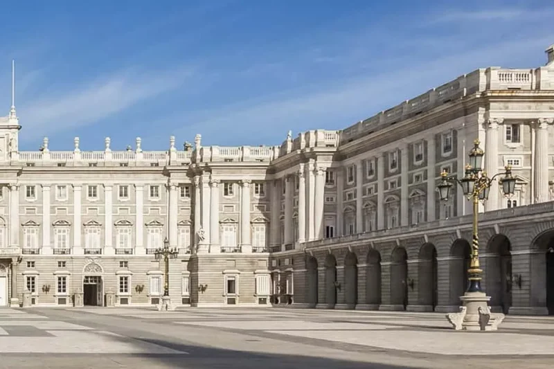 The Royal Palace of Madrid seen from the Plaza de Oriente, a grand palace-museum in Madrid, Spain