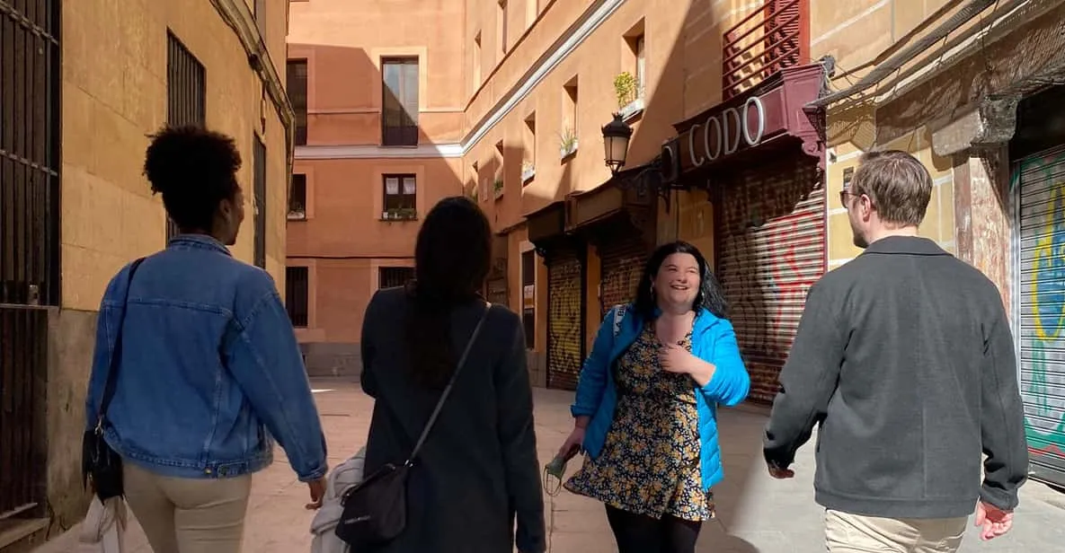 A walking-tour group in Plaza Mayor in the historic centre of Madrid, Spain
